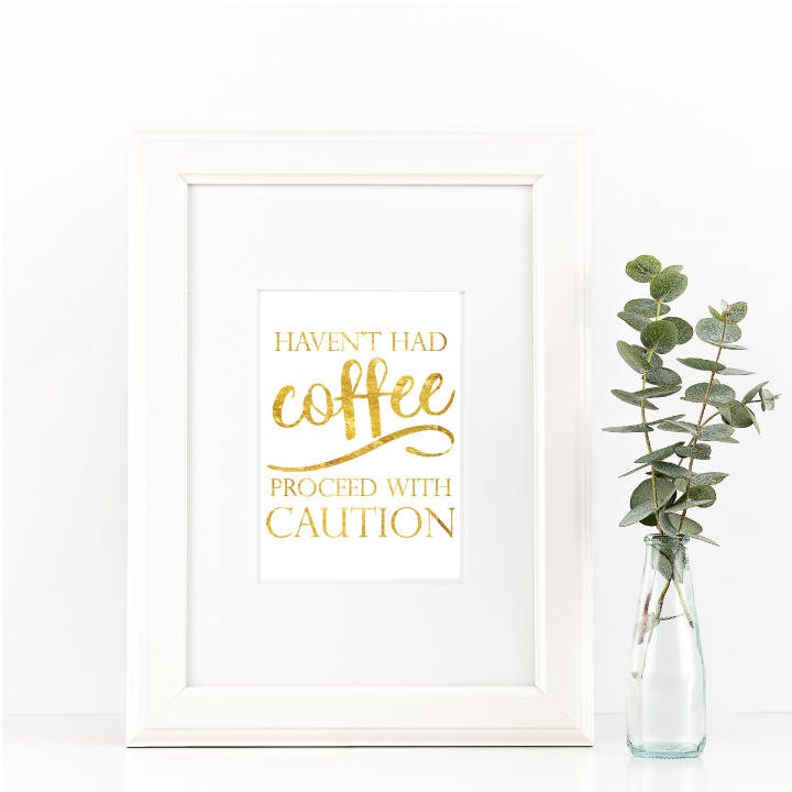 Free Printable Haven't Had Coffee proceed With Caution in gold from @pinkimonogirl for a gallery wall